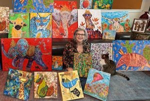 Charla-and-her paintings after kellie day art mentoring