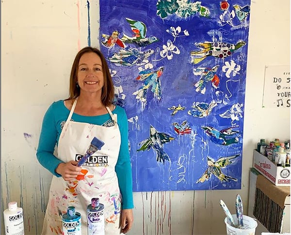 kellie day with blue bird painting