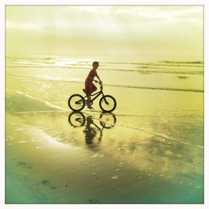 My son Chente, beach biking at Kiawah, SC